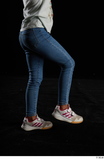 Elissa  1 blue jeans casual dressed flexing leg side…